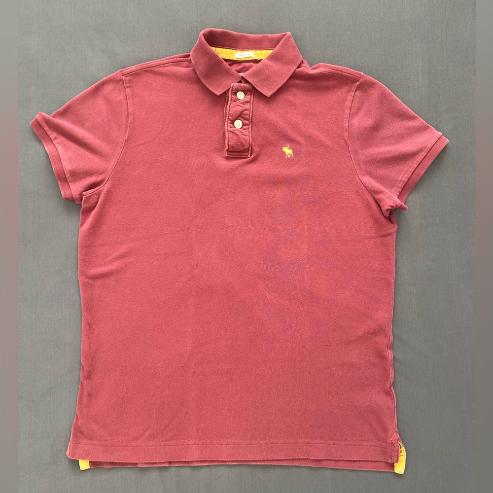 Red tile color. Excellent fabric quality w/ yellow finishes and logo embroidery.